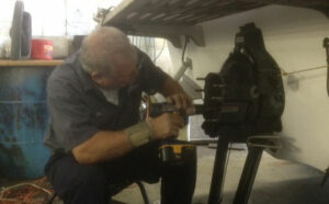 Kansas City Area Mechanic fixing boat